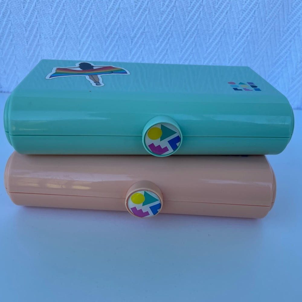 2 small Caboodles.